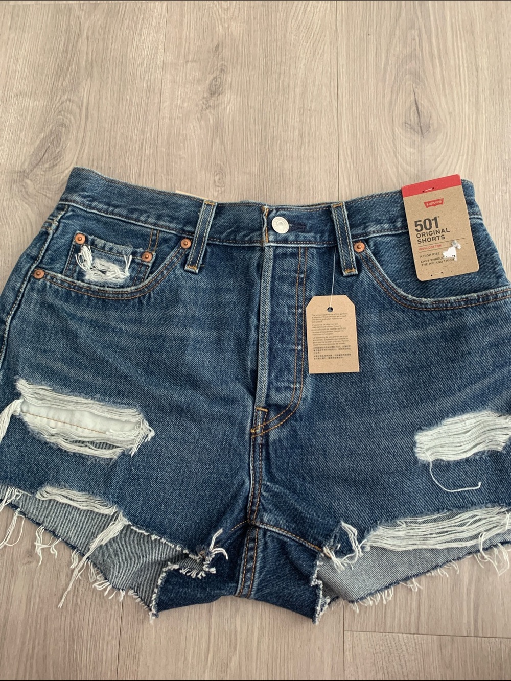 2 pair of Levi’s Dark and Light Blue Distressed High-Rise Jean Shorts!